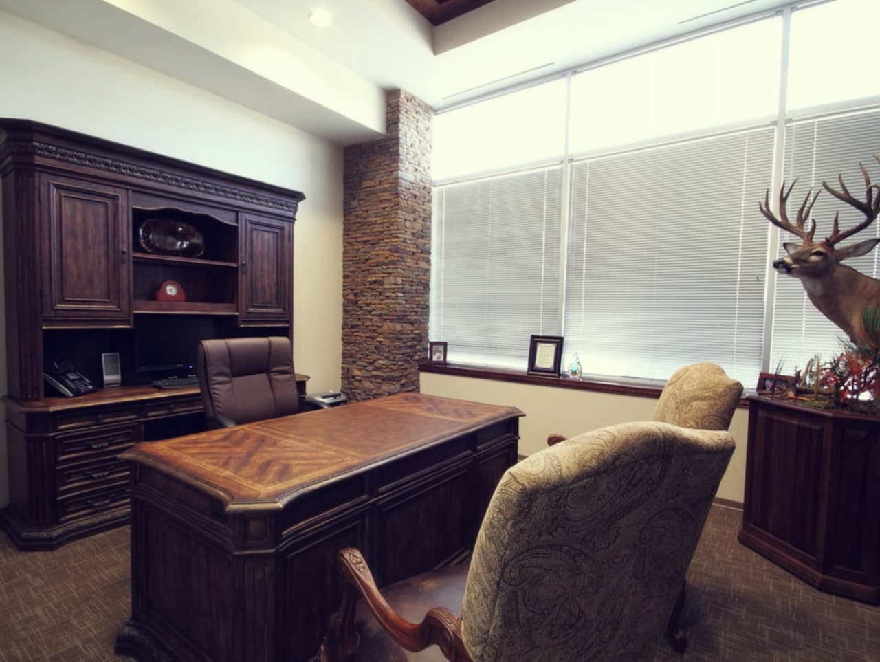 AmeriTech staff lounge with banquette and pendant lighting